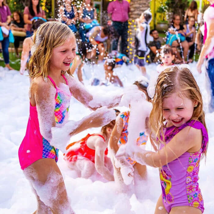Children enjoying a Foam Tastic Joy foam party